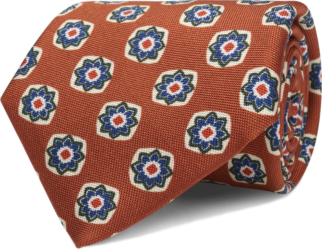 Oranžinis raštuotas kaklaraištis